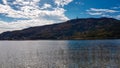 Poertschach - Reed on the lake Worth in Carinthia with view on Pyramidenkogel Royalty Free Stock Photo