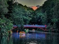 The Poet\'s bridge during New Plymouth\'s Lights Festival with Mount Taranaki on the background