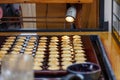 Poffertjes, little Dutch Pancakes, at baking store market.