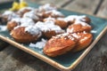 `Poffertjes`, a traditional Dutch batter treat dish resembling small, fluffy pancakes