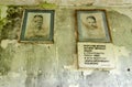 Portraits of Soviet writers A. M. Gorky and M. A. Sholokhov on wall in abandoned school in resettled village of Pogonnoye