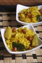 Poha - A breakfast snack made of beaten rice Royalty Free Stock Photo