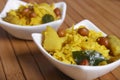 Poha - A breakfast snack made of beaten rice Royalty Free Stock Photo