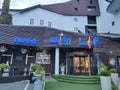 Poiana Brasov, Romania - September 25, 2022: Alpin Resort Hotel entrance. Royalty Free Stock Photo