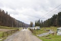 Trailer camp and tourists visiting Poiana Cerbului Royalty Free Stock Photo