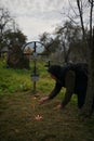 Poienile Izei, Maramures, Romania, October 19, 2018: Person praying in the cemetery at holy day