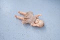 poignant image doll lying lonely on floor, abandonment, loss, and resilience, societal or personal issues, Collectibles and