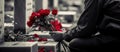 sad soldier placing flowers on a tombstone. Veterans Day, Memorial Day. grief concept. Royalty Free Stock Photo