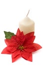 Poinsettia with yellow candle