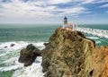 Point Bonita Lighthouse outside San Francisco, California stands at the end of a beautiful suspension bridge. Royalty Free Stock Photo