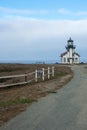 Point Cabrillo Light House near Fort Bragg California, on the Pacific Ocean. Road leading lines into the lighthouse Royalty Free Stock Photo