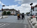 Point 0 KM Yogyakarta. There is a pedicab stopping in traffic light Royalty Free Stock Photo