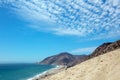 Point Mugu seen from Sandy Dune vista under beautiful sunny cumulus cloudscape in Southern