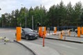 Point of passing cars to airport parking. Auto drives up to slag-boom and payment terminal Royalty Free Stock Photo