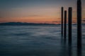 Point Roberts pilings and silky water at night time