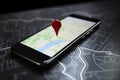 Point on smartphone with GPS navigator icon and map AI generated Royalty Free Stock Photo