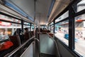 Point of view Asian people ride on second deck of tram train in Hong Kong city. Public transport, Asia travel Royalty Free Stock Photo