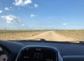 Point of view of a driver on a dirt road in the interior of Brazil.