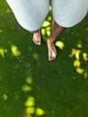 Point of View of person walking on green moss