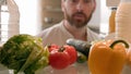 Point of view POV inside refrigerator Caucasian man husband guy male homeowner chef cooker open fridge door full of Royalty Free Stock Photo