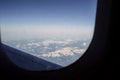 Point of view pov of passenger traveling in airplane above mount Royalty Free Stock Photo