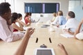 Point Of View Shot Of Businesspeople Around Boardroom Table