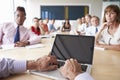 Point Of View Shot Of Businesspeople Around Boardroom Table Royalty Free Stock Photo