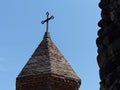 Pointed bell tower of a medieval church of Saint George of Sighnaghi in Georgia. Royalty Free Stock Photo