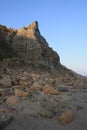 Pointed Cliff on Rocky Coastal Beach