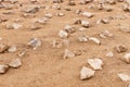 Pointed stones on sand Royalty Free Stock Photo