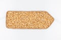 Pointer made of rope, filled with a grain of oat. Isolated