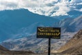 A pointer to a fork in the road in Muktinath and Chinchar, Nepal