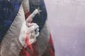 Pointing finger hand gesture the backdrop of the American flag. Concept with double exposure Royalty Free Stock Photo