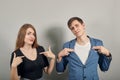 Pointing with hand at chest and staring. Shocked facial expression. Couple Royalty Free Stock Photo