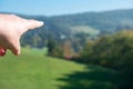 Pointing hand showing direction and giving orientation to a goal