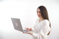 Pointing laptop screen, portrait of caucasian woman pointing laptop screen. Woman holding modern laptop with empty blank Royalty Free Stock Photo