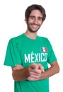 Pointing mexican sports fan with beard Royalty Free Stock Photo