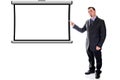 Pointing to blank projection screen. man in suit Royalty Free Stock Photo