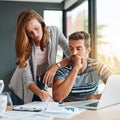 She always points out our best options. an affectionate young couple working on their household budget. Royalty Free Stock Photo