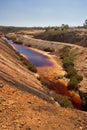 Poisoned water in an abandoned open pit mine