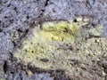 Poisonous sulfur at the bottom of a volcano crater Royalty Free Stock Photo