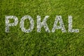 Pokal (german cup) written on grass Royalty Free Stock Photo