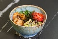 A poke bowl with Chuka Wakame seaweed, wasabi, avocado, cashew, nori, shrimps