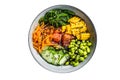 Poke bowl with fresh Salmon fish, rice, seaweed, edamame, cucumber and black sesame. Isolated on white background. Royalty Free Stock Photo