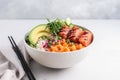 Poke bowl with salmon islated on white background AI generated