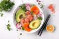 Poke bowl with salmon islated on white background AI generated
