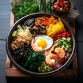 Poke bowl with shrimps, shiitake mushrooms, green and black seaweed, carrot, cucumber, celery, grated mango, sliced beef, radish,