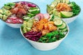 Poke bowl variety. Healthy Hawaiian dish with salmon, tuna, and shrimps