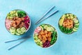 Poke bowl variety. Healthy Hawaiian dish with salmon, tuna, and shrimps