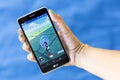 Pokemon Go game in a hand Royalty Free Stock Photo